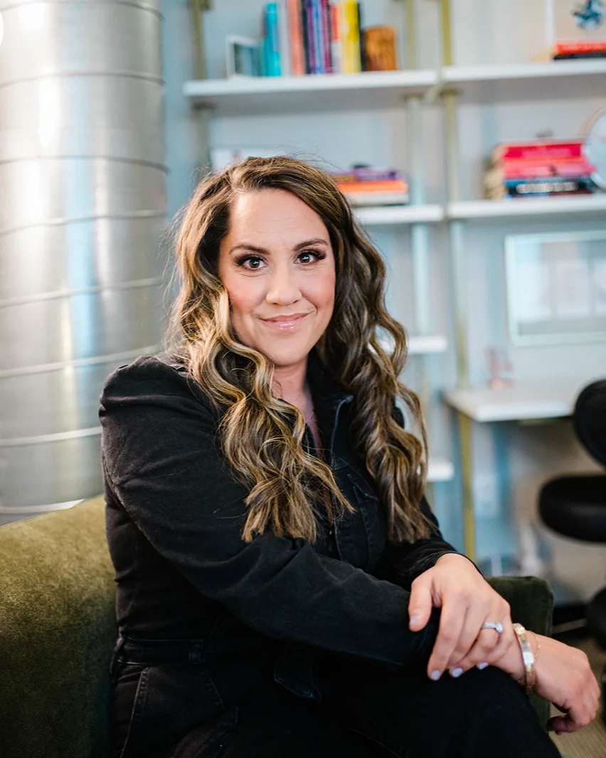Dr. Lily Zehner seated in her Denver office